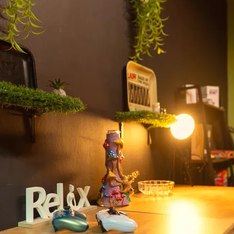 The Relix sign by lamplight